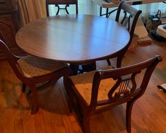 #23	Round Pedistel Table on wheels  w/4 harp Chairs - 42x28	 $175.00 			
#134	2 Harp Back Chairs (1 with arms and 1 without arms) (as is)	 $40.00 			
