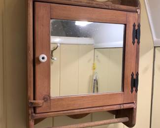#93	wood medicine cabinet with 1 door and mirror 17x5.5x23	 $30.00 			
