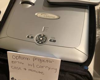 #207	Optoma Projector EP716 w Carring case and remote	 $20.00 			
