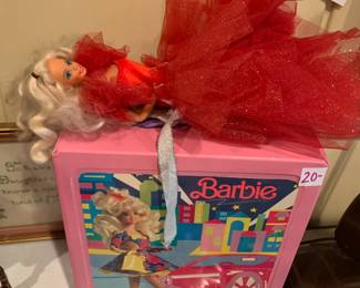 #209	1989 Barbie case with 1 barbie in a red gown	 $20.00 			
