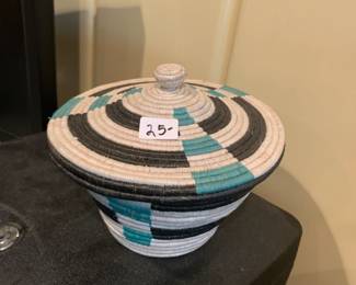 #210	hand woven basket and lid green, cream brown 	 $25.00 			
