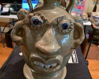 #212	ugly man 2 face pottery jug by Jerry Brown Hamilton A1   11.5 inches tall	 $200.00 			

