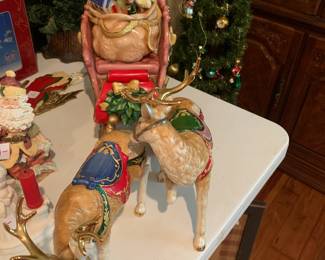 #220	3 piece as is (1 ear on deer) sleigh with 2 deer	 $20.00 			
