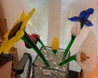 #229	7 blown glass flowers in a square glass vase 	 $25.00 			
