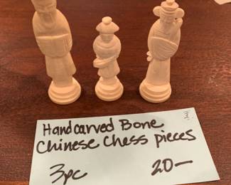 #232	lot of 3 hand carved bone chinese chess pieces 3-3.5 inches tall 	 $20.00 			
