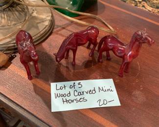 #231	lot of 3 wood carved mini horses 4 inches tall	 $20.00 			

