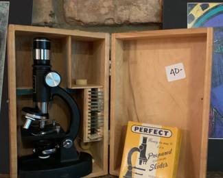 #240	Lafayette zoom crocscope 50750x in wood box with box of slides 	 $40.00 			
