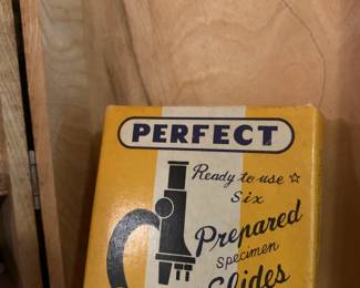 #240	Lafayette zoom crocscope 50750x in wood box with box of slides 	 $40.00 			
