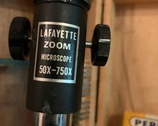 #240	Lafayette zoom crocscope 50750x in wood box with box of slides 	 $40.00 			
