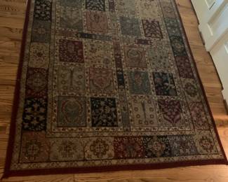 #246	62 x 93 machine made rug burgundy/blue tan 	 $40.00 			
