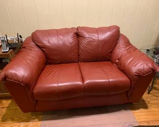 #1	Red Leather Loveseat - 69" Long	 $275.00 			
