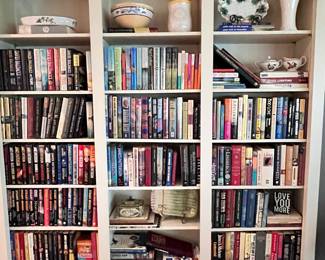 Lots of books with jacket covers and a wide variety of       authors. David Baldacci, John Grisham, James Patterson, Stuart Woods, James Lee Burke and many others. 
