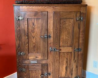 Gainer & Kroehler antique oak icebox. Logan Square. Chicago. 47-1/4 “ high. 33-1/2” wide. 19-1/8” deep at the base