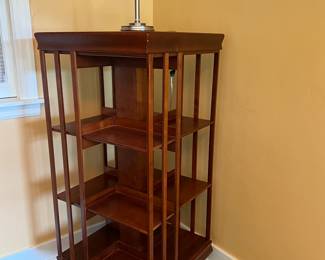 Danner style rotating cherry bookcase. 22-1/4” square. 49-1/4” tall.
