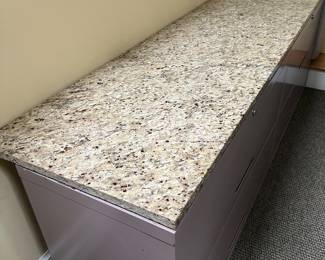 Granite top. 81-1/2 “ long by 22” deep