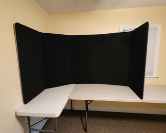 Tabletop presentation display panels. 127” length. 46” high. 5-24” articulating sections
