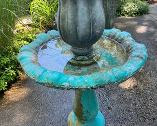 Vintage birdbath with tulip shaped planter.