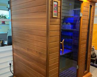 Sunlight Signature III sauna. Excellent condition. Works well. Full spectrum chromotherapy far infrared sauna.  63” wide by 48” deep by 76” high. It is wired for 110-120 volts using a 20-amp circuit. It requires a 20-amp outlet because it has a 20-amp plug