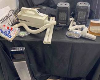 Keep Warm While You Clean Oreck XL Handheld Vacuum  Heaters 