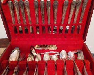 Oneida Tudor Plate 
8 salad forks, 12 forks, 8 long teaspoons, 12 teaspoons, 8 tablespoons, 12 knives, 8 spreaders (individual butter knife), ladle, 4 serving utensils, butter knife