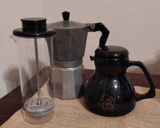 Stovetop espresso maker, milk frothier, travel mug from the National Air & Space Museum