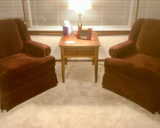 Pair of matching dark burgundy upholstered chairs by England Inc., TN, side table, lamp