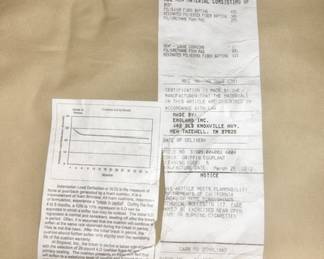 Dark burgundy upholstered chair label by England Inc., TN