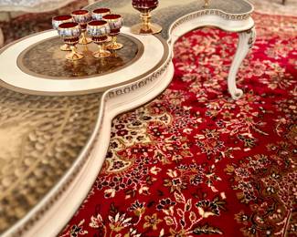 Beautiful carpet and Hollywood regency table