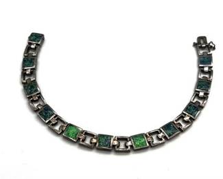 Lot 061   1 Bid(s)
Sterling Silver Green Gemstone Bracelet 8"