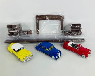 The National Motor Museum Mint Diecast Cars and Display Case for 12 Cars
