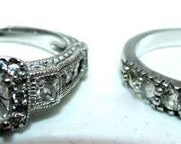 Lot 102   10 Bid(s)
2 Sterling Rings Clear stones