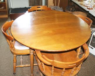 Round Table with Six Arm Chairs