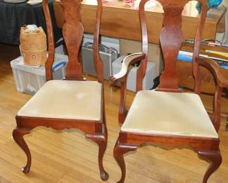 Hitchcock Furniture Dining Table with 3 Leafs and table pads.  Also, 5 Hitchcock Furniture Chairs.  Table and Chairs are available separately.