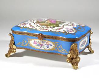 SEVRES STYLE PORCELAIN BOX | With acanthus leaf dore bronze mounts - l. 13.26 x w. 9.25 x h. 6 in.