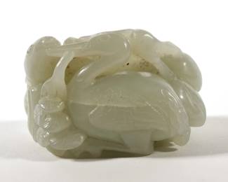 CHINESE CELADON JADE FIGURAL GROUP | Carved pale celadon jade figural group showing a deer and stork among flowering branches; 128g
 - l. 2.25 x w. 1.75 x h. 1.5 in.