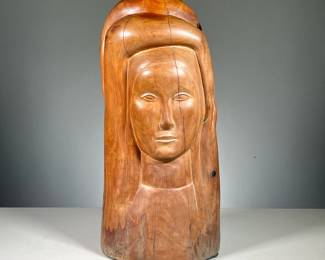 LINTON (20TH CENTURY) | Female figure with arms overhead. Carved wood. A modernist sculpture depicting female figure with her arms crossed over her head. Signed on the base "LINTON"