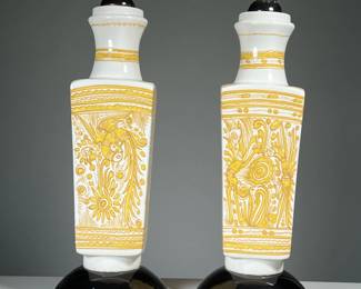 PAIR MID-CENTURY LAMPS | Mid-century pottery vases with mustard yellow hand-painted decoration of phoenix birds and mythical figures, mounted as table lamps. No apparent signature. h. 14 x 4.5 x 4.5 in. (vase only) - h. 29.75 x dia. 6.25 in. (over harp)