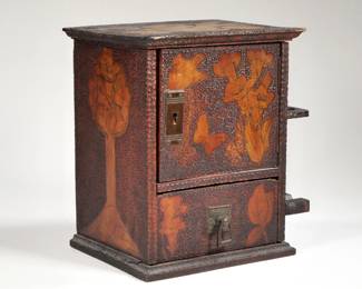 FOLK ART PIPE & TOBACCO BOX | Early 1900s handmade tobacco box and pipe holder in art noveau / japonisme style, having a cabinet door of a singled rawer with a rack for four pipes on the side, with Christmas dedication on verso, "Jim / With much love from May / Xmas 1900" - l. 9.5 x w. 6.75 x h. 10.5 in.