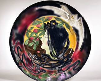 ART NOUVEAU MAJOLICA CHARGER | Showing the head of a woman crested by a dove, marked on the underside "CICO / GERMANY / 34" with impressed number 736 - dia. 16 in.