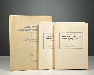 (3pc) RORSCHACH & OTHER TESTS | Including two sets of Hermann Rorschach "PSYCHO DIAGNOSTICS PLATES / HANS HUBER, BERN / MEDICAL PUBLISHER", one set with printed Rorschach signature on verso of cards, the other without; plus "CHILDREN'S APPERCEPTION TEST (C.A.T.) by Leopold Bellak... Fifth Printing 1957" - w. 9 x h. 11.5 in. (C.A.T.)