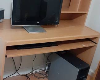 Computer desk.  $10.  Monitor and older hard drive, can sell separately.