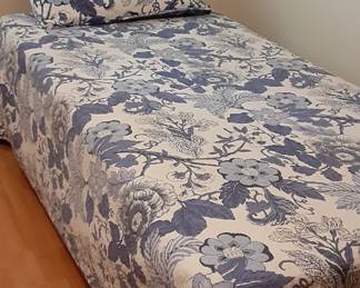 Twin bed.  Nice mattress. Frame on wheels.