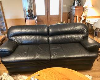 Black faux leather sofa