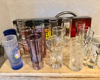 Large collection of shot glasses