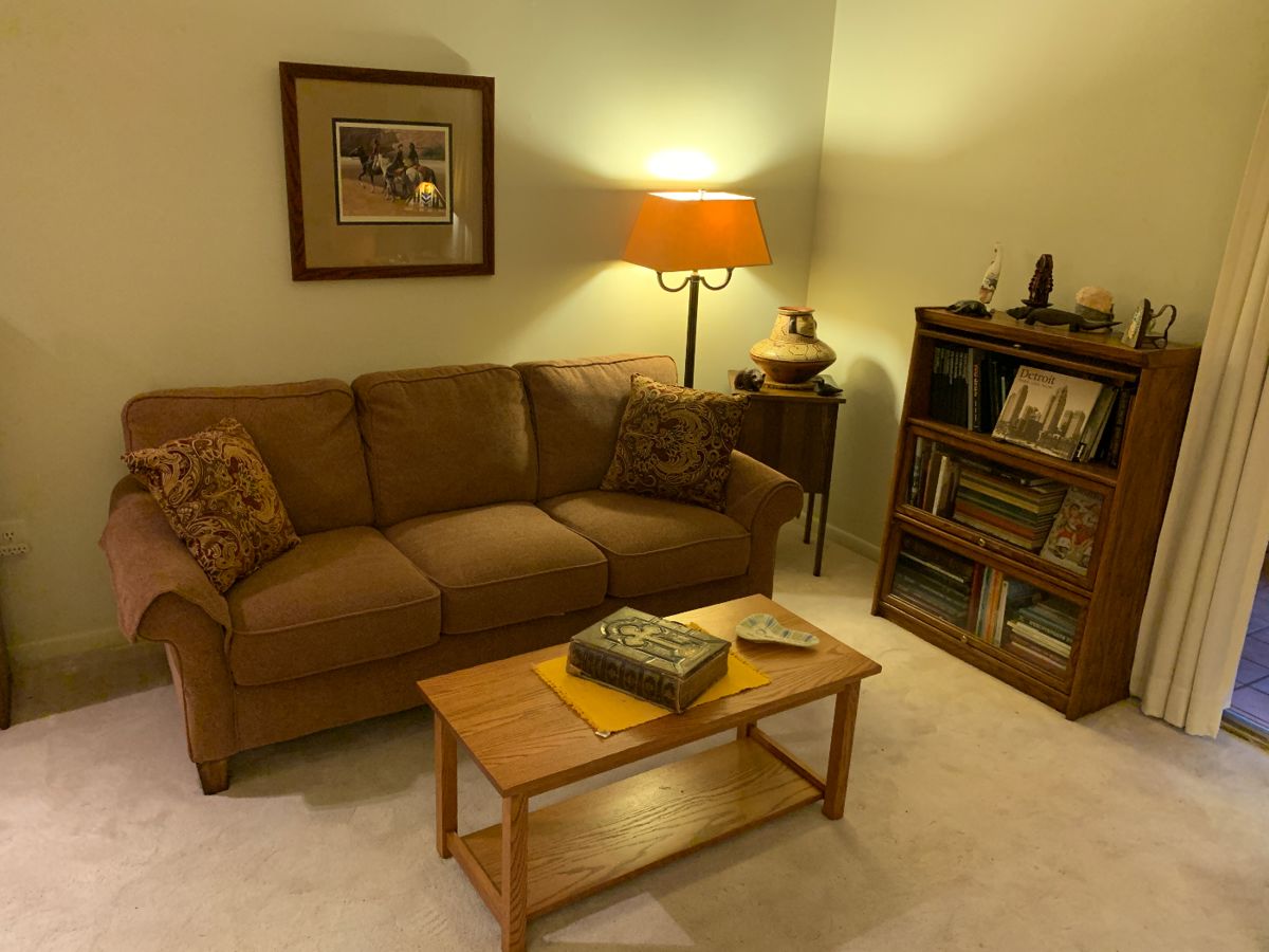 Beautiful like new quality made sofa, coffee table, barrister book case