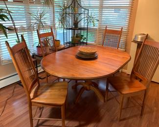 Beautiful oak kitchen table with set of four chairs