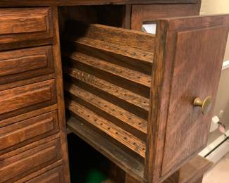 Stunning turn of the century oak antique dental / jewelry cabinet