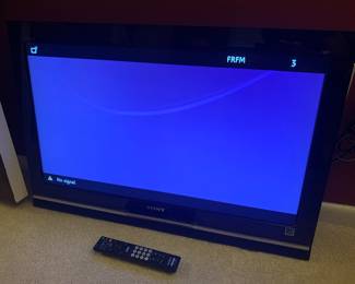 Flat screen tv with wall mount attached