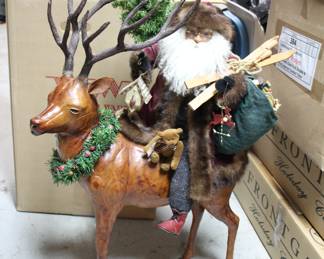 Santa on leather reindeer