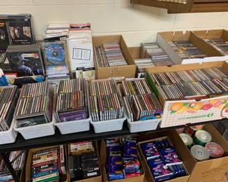 Hundreds of CDs many are sealed